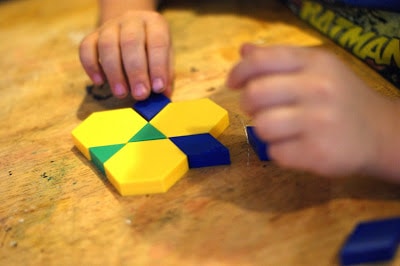 Strengthen fine motor skills using pattern blocks as a teaching resource. 